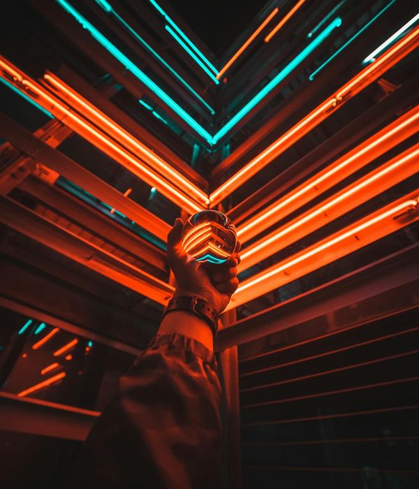 Silhouettes of different people united by abstract shapes and colors.